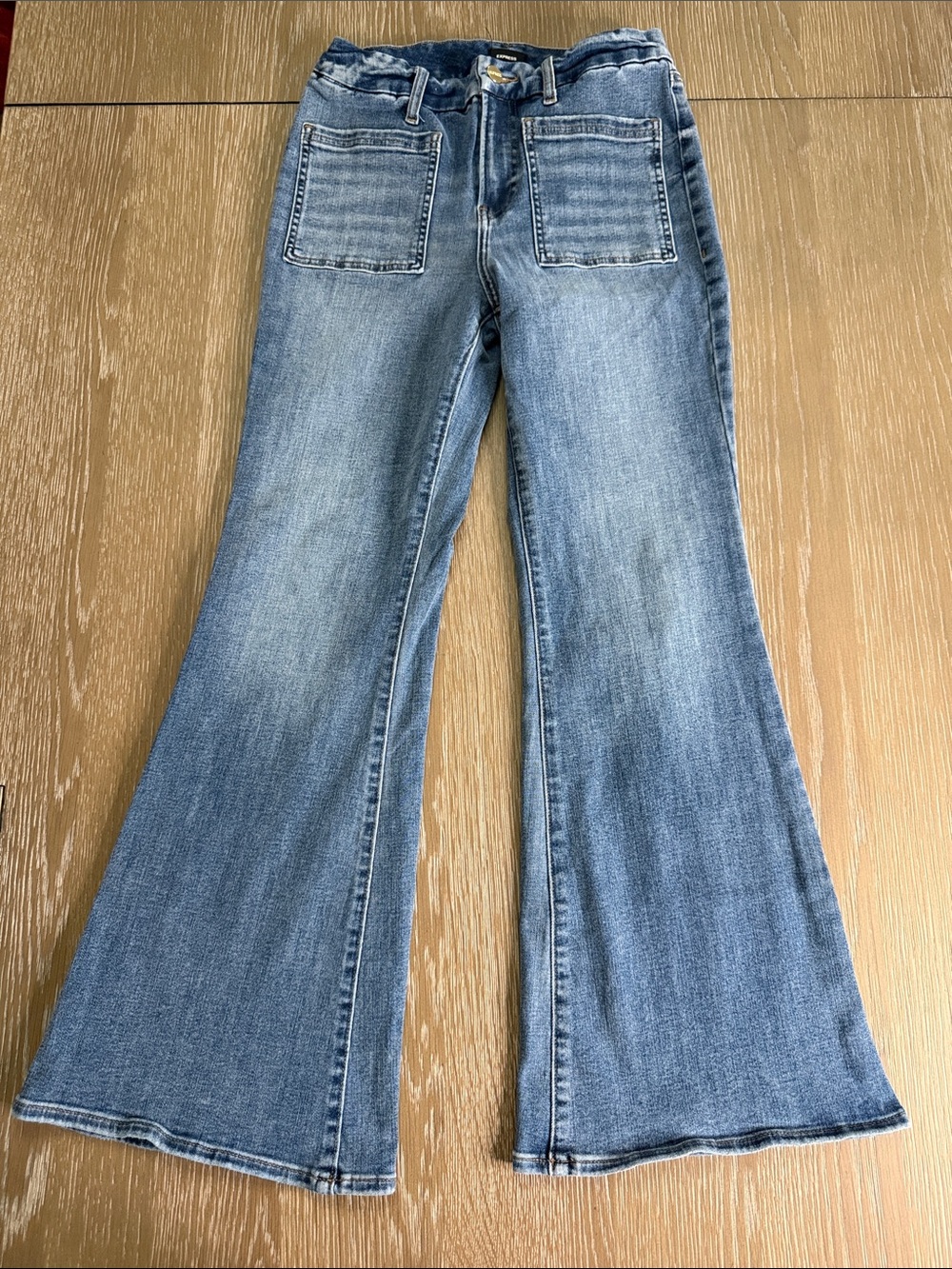 Gently used Express Women's 70s Flare midrise flexx hyperstretch Jeans